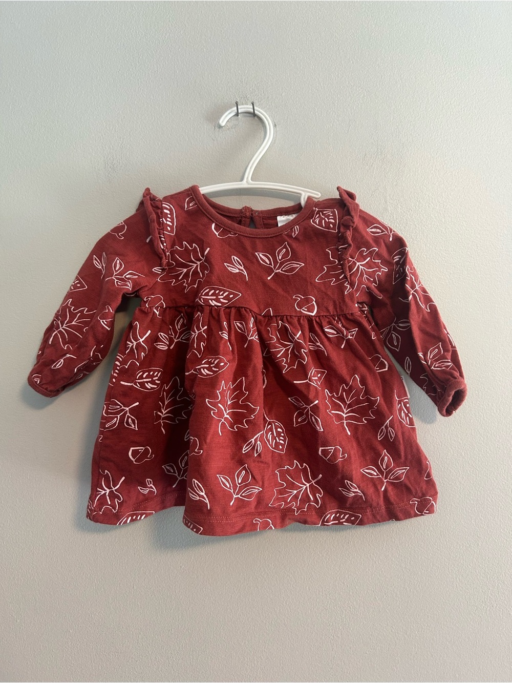Gerber 0/3m red leaf Long-Sleeve flare top with shoulder ruffles